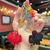 Popular llavero de murciélago de arcilla de doble cara incrustado con diamantes, pequeño colgante de Halloween para niñas, exquisito charm de bolso con cuentas de cristal