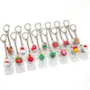 Navidad 9 Teclas Alivio del Estrés Botón Luminoso Juguete para Aliviar el Estrés Keycap Llavero Teclado DIY Juguete para Aliviar el Estrés Colgante