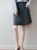 Falda corta de punto de lana pura estilo A para otoño e invierno, de cintura alta, con una caída favorecedora, efecto adelgazante, adecuada para ir al trabajo, diseño simple, e ideal para figuras petite.