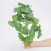 Colgante de pared de vegetación de hoja de sandía artificial, hoja redonda, hoja de monstera, flor artificial, enredadera colgante de plástico, decoración de pared de plantas, accesorios decorativos, flor