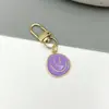 Nova ideia de presente internacional para o primeiro dia de aula: chaveiro acessório decoração pingente de rosto sorridente metálico arco-íris