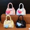 Bolso Cubo de Diseño Casual de Nicho de Comercio Exterior 2026 Primavera/Verano Bolso Coreano para Mujer con Acabado de Alta Gama Nuevo Estilo Bolso de Hombro Único Cruzado