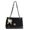Bolso de hombro de cadena con patrón de diamantes retro estilo francés 2026, un bolso femenino de nicho y versátil con gamuza mate y diseño de bloques de color