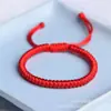 Nueva cuerda roja nudo de diamante tejida a mano cuerda de mano novias niños amantes este año pulsera joyería al por mayor