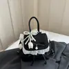 Mochila de Viagem com Laço para Mulheres 2026 Novo Estilo de Verão Bolsa Escolar Bolsa de Mão para Estudante Universitário e Commuter Item Quente de Verão