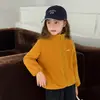 Tutu Elefantito Ropa Infantil Chaqueta Tres Pruebas para Niñas Otoño/Invierno 2026 Nuevo Abrigo Impermeable con Capucha para Exteriores Infantiles