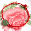 Tienda de 2 yuanes pulsera de cuerda roja de pescado anual al por mayor pulsera de pareja lote de regalo pequeño