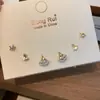 Conjunto de Pendientes de Falda Dorada Full Diamond de Lujo Ligero Estilo Coreano Pendientes de Hoja de Ginkgo para Mujer Pendientes Pequeños Dulces y de Personalidad Sencilla