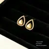 Pendientes de Latón de Alta Gama con Incrustaciones de Circonita para Mujer, Trébol de Cuatro Hojas Versátiles de Moda Lujo Ligero Estilo Chanel