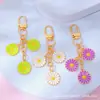 Estilo Ins Flor de Margarita con Goteo de Aceite Borla Llavero Creativo Colgante para Bolsa de Auriculares de Niñas Venta Caliente