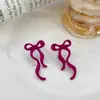 Nuevos aretes de lazo de cinta transfronterizos, aretes simétricos de moda, aretes del mismo estilo más vendidos en Amazon, venta al por mayor del fabricante