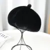 Boina de invierno para mujer, pelo sintético de visón, engrosada y cálida, en stock para venta al por mayor, sombrero de moda versátil de felpa para proteger los oídos en otoño e invierno