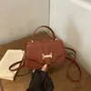 Bolsa Quadrada Pequena Simples Lisa Transfronteiriça 2026 PU Nova Estilosa Textura Retrô Para o Dia a Dia Ombro Único Transversal De Mão Feminina