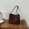 Bolso de cubo hobo vintage minimalista coreano para mujer, otoño, gamuza de felpa de nicho, bolso casual versátil de un solo hombro para llevar debajo del brazo