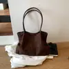 Bolso de mano de felpa y gamuza para mujer 2026 Nuevo Otoño Invierno Tacto de alta gama Retro Versátil Gran capacidad para ir al trabajo Bolso de hombro