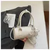 Bolsa de Mão Cilíndrica Exquisita e Moderna 2026 Nova Bolsa Transversal Versátil Feminina Pequena Bolsa Tote Bolsa Almofada