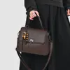 Bolso pequeño de moda y sofisticado para mujer, nuevo y elegante bolso tote retro para el día a día, versátil bolso de hombro y cruzado, moderno