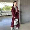 Conjunto estilo casual esportivo para meninas primavera e outono novo moderno crianças médias e grandes estilo versátil jaqueta calça pantalona conjunto de duas peças