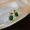 Pendientes de mariposa y flor de circón verde ultrabrillante transfronterizos, sensación de lujo ligero de alta gama, pendientes versátiles con un diseño único