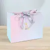 Bolsa de presente com bloqueio de cores suave em azul claro e rosa para flores do Dia dos Namorados, embalagem de caixa de presente, saco de papel espesso laminado