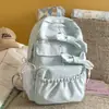 Mochila Estilo Coreano Ins Leite Névoa Laço Feminina para Estudantes, Versátil para o Campus e Saídas Doces