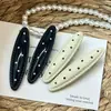 Pinza para el pelo ovalada de lunares estilo coreano, simple y versátil, pinza de cocodrilo estilo girly, accesorio para el pelo al por mayor, pinzas blancas y negras al por mayor