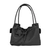 Bolso tote de nicho estilo coreano 2026 nueva moda versátil texturizado para el hombro bajo el brazo bolsa de viaje de gran capacidad para mujer