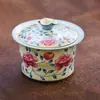 Taza de té de cerámica hecha en fábrica con diseños de loto y peonía, juego de té kung fu para uso doméstico, cuenco de té con tapa que no quema las manos