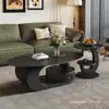 Nova mesa de centro oval em pedra sinterizada de luxo leve estilo italiano para apartamentos pequenos, sala de estar moderna, uso doméstico simples, combinação de armazenamento de alta qualidade