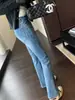 Pernas longas de supermodelo~calça flare afunilada de cintura alta, jeans de perna reta que levanta o bumbum para mulheres, 26 novo estilo outono/inverno H090908