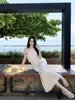 Atrapasueños de Verano Mismo Estilo que Blogger Cuello Halter Falda Fruncida Conjunto de Dos Piezas Vestido para Vacaciones en la Playa Tela de Malla