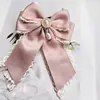 Moda Nueva Cinta de Satén Colgante de Perla Lazo Accesorio para Cuello Elegante Moda Chica Pajarita Broche