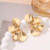 Europa y Estados Unidos aretes transfronterizos de personalidad exagerada doble flor de cinco pétalos simples retro hojas rayadas aretes con borla al por mayor