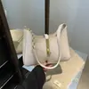 Bolsa de Axila 2026: Bolso bandolera de un solo hombro de diseño de nicho de alta gama, versátil para el trabajo, bolso tote de cadena moderno y sencillo