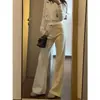 Jeans acampanados de cintura alta color blanco beige para mujer, estilo nuevo delgado de verano 2026, pantalones de campana adelgazantes y no ajustados