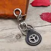 Estilo Europeo y Americano Transfronterizo Literario Retro Unisex Aleación Cuero Llavero Cuero Genuino Pequeño Regalo