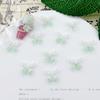 Bolsa de material para decoración de uñas con diseño de flores suaves de color verde menta y hielo, con un toque luminoso de amor y mariposas pequeñas, material mixto para decoración de uñas al por mayor