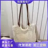 Bolso de mano grande de paja para mujer, nuevo bolso tejido para la playa de vacaciones en la costa primavera 2026, bolso de un solo hombro para debajo del brazo para mujer