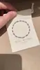 Pulsera de circonita multicolor de lujo ligero para comercio exterior europeo y americano, deslumbrante con incrustaciones de diamantes, a la moda, simple, elegante, joyería de alta gama al por mayor