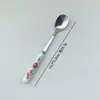 Cuchara y tenedor florales de fruta con mango de cerámica creativa, cuchara de postre de acero inoxidable 410, cuchara para remover café, cuchara y tenedor para el té de la tarde