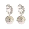 Pendientes de encaje dulce calados con perlas estilo francés para mujer, moda de nicho, elegantes, sofisticados y de alta gama, pendientes exquisitos