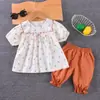 Comercio Exterior Conjunto de Verano para Niñas Nuevo Elegante Moderno Floral Manga Corta Top y Shorts Conjunto de Dos Piezas Venta al por Mayor