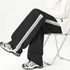Pantalones Casuales Rectos de Patchwork a Rayas de Calle Americanos Nuevos Otoño/Invierno 2026 para Hombre, Pantalones Casuales Sueltos de Pierna Ancha de Moda