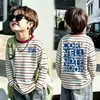 Camiseta infantil de algodão puro com listras e manga longa 2026 novo modelo estampa de desenho animado base para usar na primavera e no outono