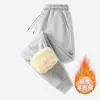 Pantalones de hombre con forro polar de invierno, engrosados para abrigar, pantalones largos casuales con puños elásticos, estilo versátil para parejas