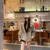 Foto Real do Cardigan Listrado Solto com Capuz Estilo Retro Americano Preguiçoso Outono e Inverno 2025 Jaqueta Casual de Manga Longa
