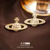 Pendientes de Planeta Saturno con Circonita de Aguja Plateada Pendientes Huecos de Diseño Único de Lujo Ligero Europeo y Americano Pendientes Exquisitos de Nicho para Mujer