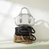 2026 Novo Modelo Fecho de Alta Qualidade Bolsa de Ombro Único Transversal Modelo Bowling Mini Bolsa de Mão Formato Bolinho Bolsa Feminina de Couro Genuíno