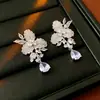 Pendientes Redondos Plegados con Borlas Tachonados de Pedrería Estilo Retro Europeo y Americano, de Moda y Versátiles, con un Toque de Lujo Ligero y de Alta Gama
