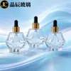 Stock de Fábrica Frasco de Vidrio Facetado Rombo de 30ml Gotero Negro Dorado Frasco de Sérum para el Cuidado de la Piel Material de Empaque Cosmético